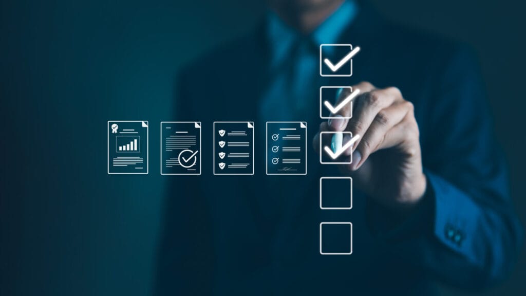 quality assurance and document control with checklist icons. businessman mark off items on digital checklist, representing quality assurance and document control processes, verification and compliance